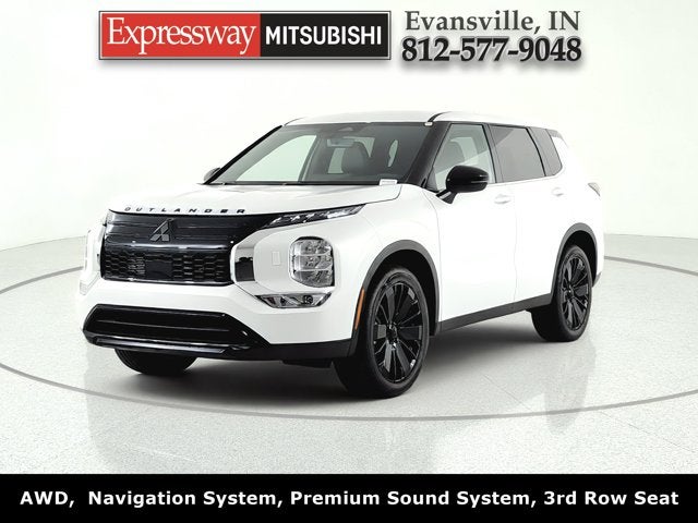2026 Mitsubishi Outlander LE in White Diamond — front three-quarter view
